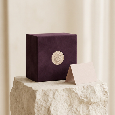 FRISSON aubergine and champagne packaging